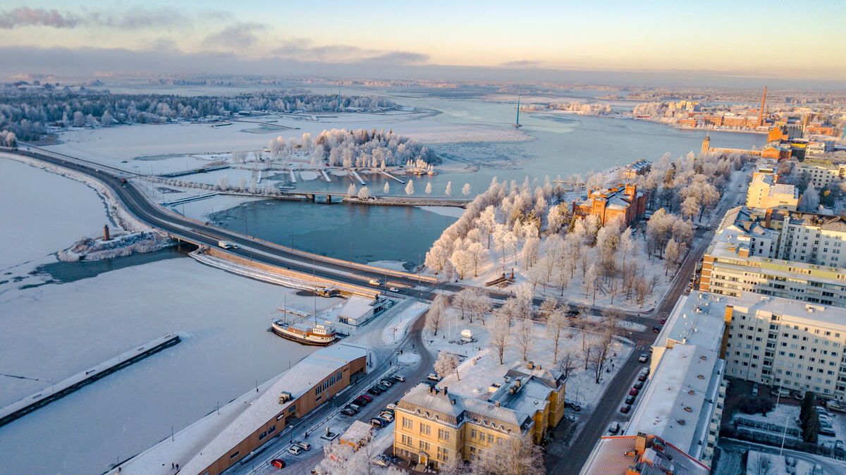 An aerial view of a snow-covered Finnish city.