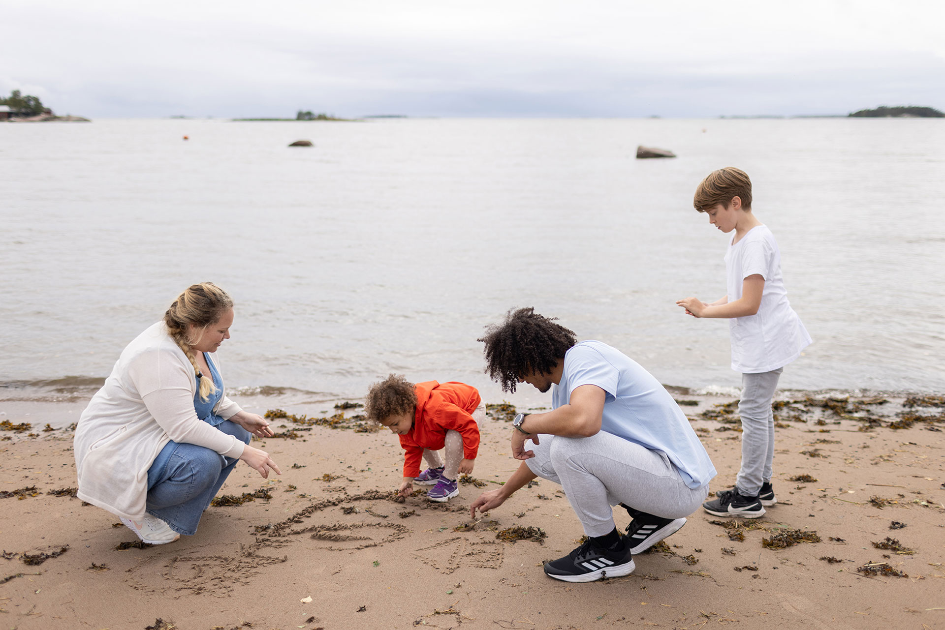 Parents and children at the beach